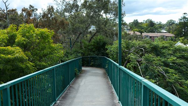 Taringa Central Pedestrian Bridge (7/06/2023 - Credits: Screen Queensland)