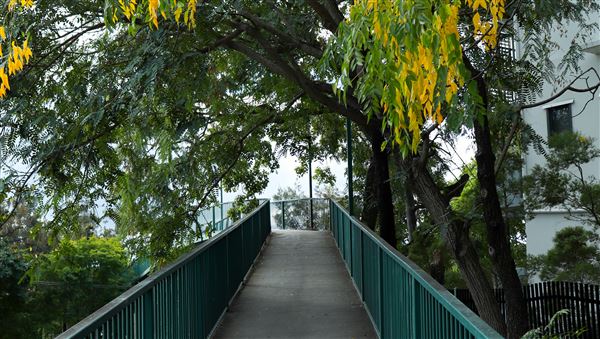 Taringa Central Pedestrian Bridge (7/06/2023 - Credits: Screen Queensland)