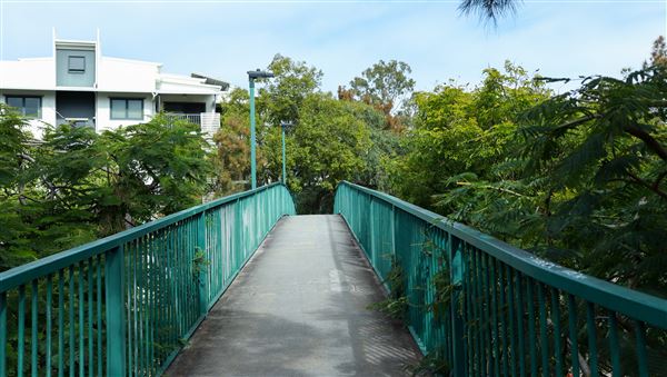 Taringa Central Pedestrian Bridge (7/06/2023 - Credits: Screen Queensland)